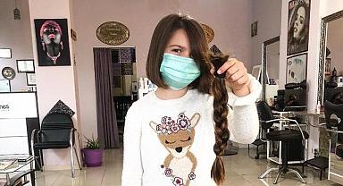 Kanserli çocuklar için saçını bağışladı