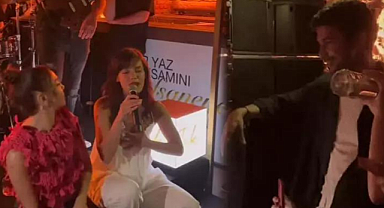 Kaan Yıldırım, sahnede şarkı söyleyen sevgilisi Pınar Deniz'den gözlerini alamadı