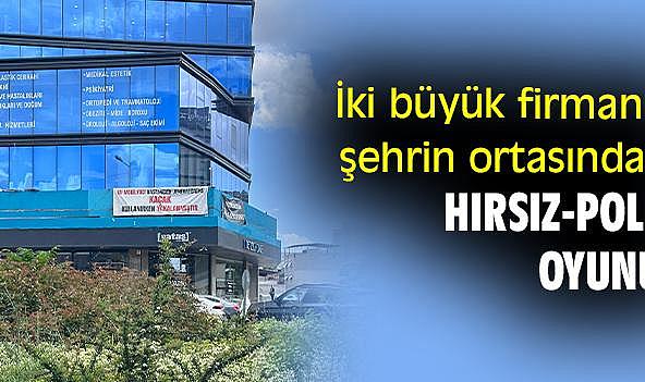 İki büyük firmanın şehrin ortasındaki hırsız-polis oyunu!