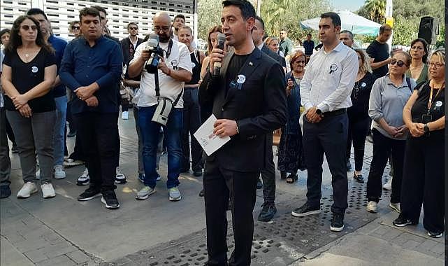 Bayraklı kadına şiddete karşı tek yürek!